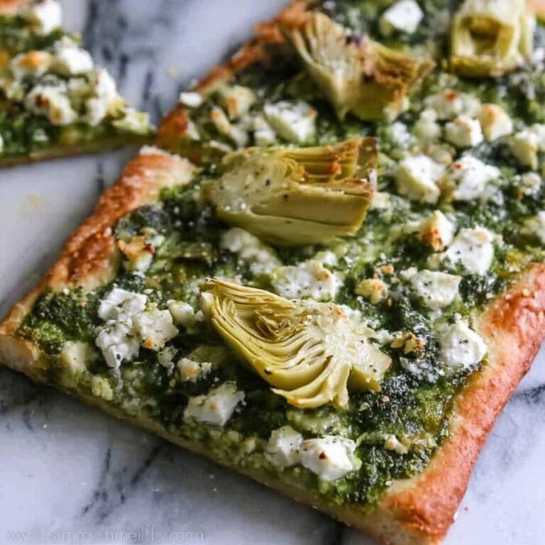 Green Pesto Pizza with Feta, Artichokes, and Fresh Arugula Recipe